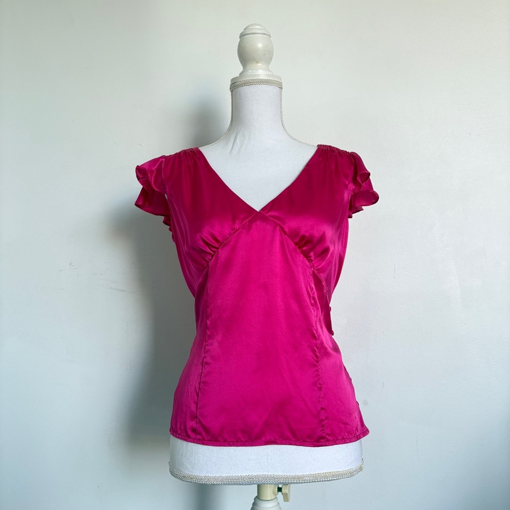 Magenta silk blouse.